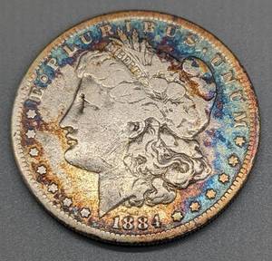 lot 128 image: 1884-S Morgan Silver Dollar