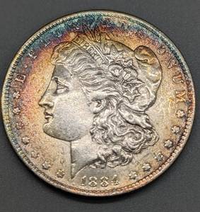 lot 129 image: 1884-O Morgan Silver Dollar