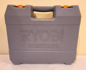 lot 201 image: Ryobi Jigsaw with Vacuum Attachment