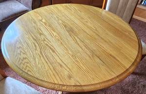lot 248 image: Round to Oval Dining Table with Upholstered Chairs.