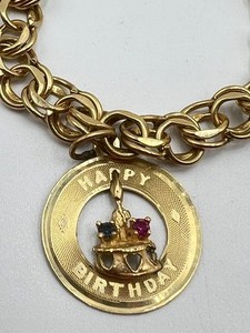 lot 18A image: 14k Bracelet with Charms