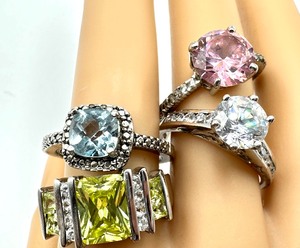 lot 316 image: Four Sparking and Beautiful Sterling Silver Rings
