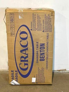 lot 53 image: Graco Benton Pebble Gray Changing Table with Storage