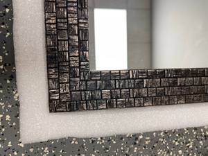 lot 61 image: Hans & Alice 40 x 24 in. Black Framed Decorative Wall Mirror with Bronze Highlights