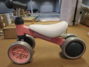 lot 831 image: BEKILOLE Balance Bike in Pink (MISSING WHEEL COVER)