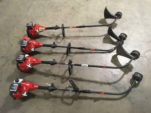Lot of assorted  Homelite Curve Shaft Trimmers, various conditions Customer returns Review all pictures