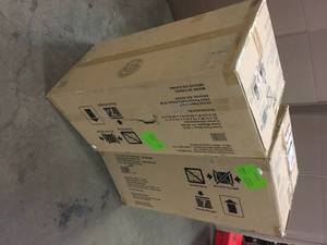 lot 11 image: Husky  Ready-to-Assemble 24-Gauge Steel Wall Mounted Garage Cabinet in Red (28 in. W x 29 in. H x 12 in. D) Customer returns Review all pictures