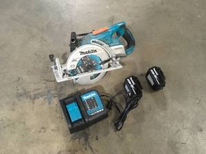 lot 40 image: Makita  18V X2 LXT Lithium-Ion (36V) Brushless Cordless Rear Handle 7-14 in. Circular Saw Customer returns Review all pictures