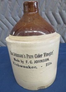 lot 12 image: ANTIQUE ADVERTISING JUG