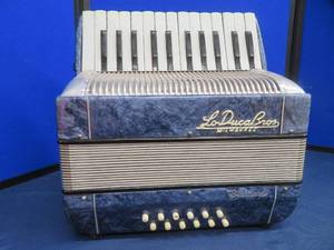 lot 63 image: LO DUCA BROTHERS CHILD SIZED ACCORDION