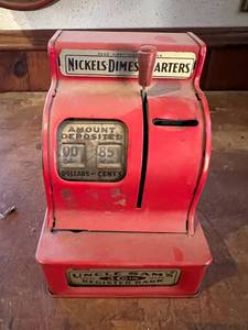 lot 414 image: Uncle Sams Register Toy Bank