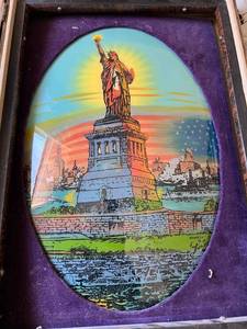 lot 614 image: Vintage Statue of LibertyEllis Island Curved Oval Glass Memorabilia