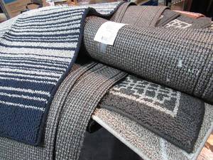 lot 35 image: Lot of 19 Rugs  Great For Garage or Pet Areas