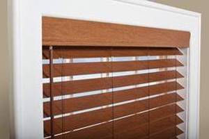 lot 58 image: 73-58 x 23 - 2 Inch Faux Wood Blinds by Levolor