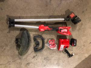 Milwaukee  M18 18V Lithium-Ion Brushless Cordless String Trimmer Kit with 6.0 Ah Battery and Charger Customer returns Review all pictures