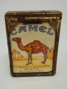 lot 22 image: Vintage Collectible Brass Colored Compact Case with Camel Cigarettes