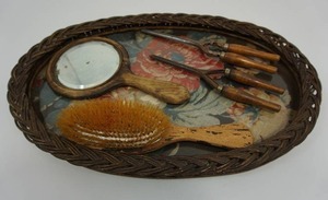 lot 26 image: Vintage Wicker Dresser Tray, Antique Curling Irons, Mirror and Brush