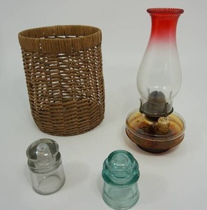 lot 27 image: Antique Hurricane Lamp with Ruby Shade, Glass Insulators, Wicker Basket