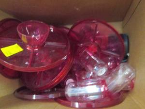 box of plastic serving trays and mo...