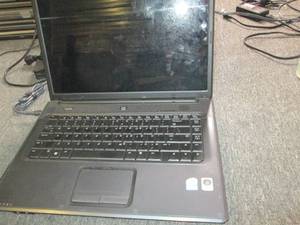 compact laptop powers on no chargin...