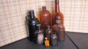 brown antique bottles...