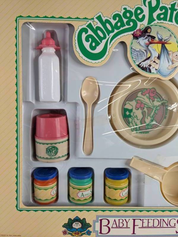 lot 67 image: Set of 2 Vintage Collectible 1983 Cabbage Patch Kids Baby Feeding Sets K