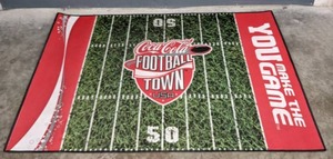 lot 112 image: Coca Cola Football Town USA Rug  U