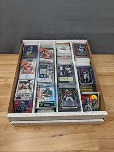 lot 35 image: Large NFL Football Card Collection Hurts Diggs Sanders McCaffrey Montana Rice U