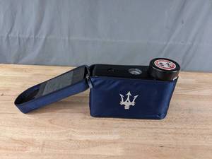lot 25 image: Maserati OEM Air Compressor Pump Kit with Case U
