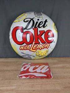 lot 100A image: Diet Coke with Lemon Wall Advertisement and Coca-Cola Inflatable Football U