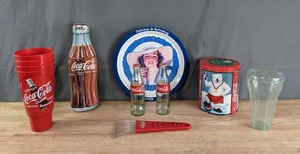 lot 101 image: Coca Cola Collectibles Cups, Tins, Bottles and More U