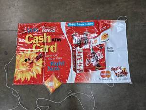 lot 125 image: Coca-Cola Advertising Sign with Inflated Sun Drinking a Can of Coke U