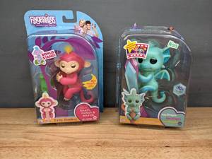lot 148 image: New Baby Dragon and Baby Monkey Fingerlings  W