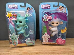 lot 140 image: New Baby Dragon and Baby Monkey Fingerlings  W