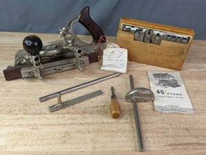 lot 83 image: Vintage Stanley No. 45 Plane with Cutters  M