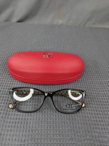 lot 399 image: New Carolina Herrera Glasses with Display Lenses and Case L