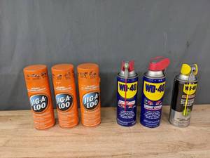 lot 256 image: New Cans of Jig A Loo Lubricant and WD 40   M