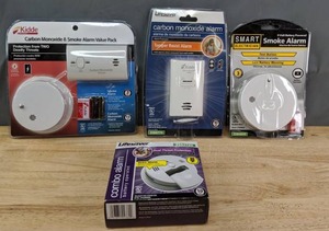 lot 210A image: Kiddle Carbon Monoxide & Smoke Alarm Value Pack, Life Saver Carbon Monoxide Alarm, Smart Electrician Smoke Alarm and Life Saver Combo Alarm R