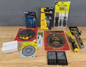 lot 168 image: Assortment of New Name Brand Tools Stanley Screwdriver, Wrench, Saw Blades, Table Vise and More R