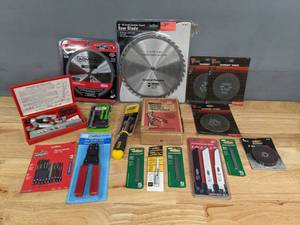 lot 165 image: Assortment of New Tools Reciprocating Saw Blades, Screwdrivers, Crimping Tool, Saw Blades and More R