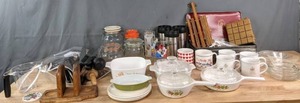 lot 272 image: Kitchen Essentials Corning Ware, Gevalia Travel Mugs, Measuring Cup, Napkin Holder, & More R