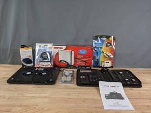lot 311 image: Computer Items Including a Gaming Mouse, Laptop Travel Kit, External Hard Drive Enclosure and More  R