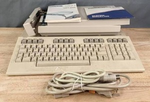 lot 139C image: Vintage Commodore 1571 Computer Floppy Disk Drive and Commodore 128 System Diskette R