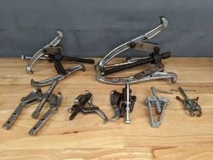 lot 317 image: (3) Jaw Gear Pullers, Battery Post Puller, Valve Spring Compressor R
