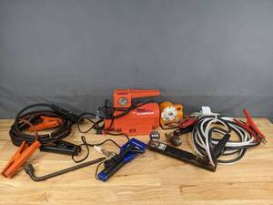 lot 319 image: Raft Inflator, Interdynamic Air Compressor, 12 Volt Ice Scraper, (2) Jumper Cables, and Hitch R