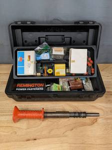 lot 331 image: Black Toolbox with Remington Powder Actuated Tool, Stud Drivers, Power Fasteners and More   R