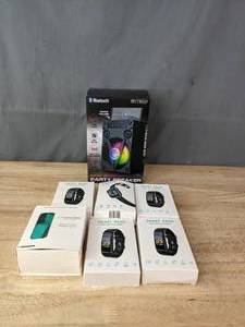 lot 320A image: An Assortment of Wearable Technology and Bluetooth Party Speaker R