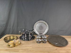 lot 323 image: Vintage Faux Gold and Silver Service Platters, Trays, Teacups, and More R