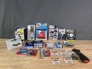 lot 325 image: Various Car Parts, Febreze Car Clips, Spark Plugs, Blind Spot Mirrors, Dash Board Sticky Pad, Car Camcorder and More R