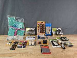 lot 329 image: A Collection of Household Items Including Furniture Riser Feet, Floor Protection Sliders, Jumbo Aluminum Hook and More  R